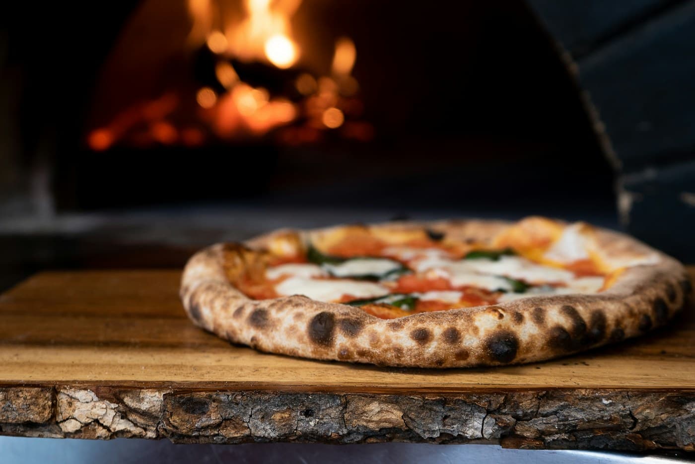 Deux pizzas achetées, la troisième offerte - Pizza & Co
